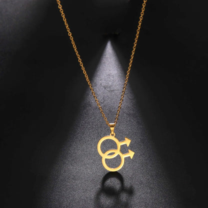 Collier gay double Mars doré : deux symboles masculins entrelacés, sur chaîne à maillons