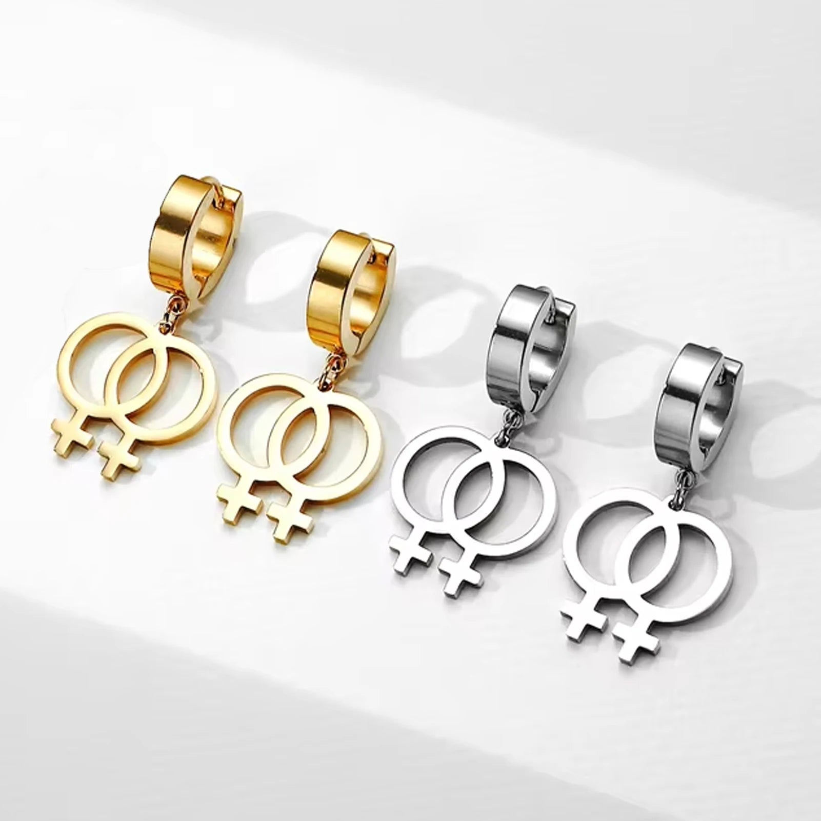 Boucles d'oreilles créoles avec pendentif double Vénus, symbole lesbien, acier et doré
