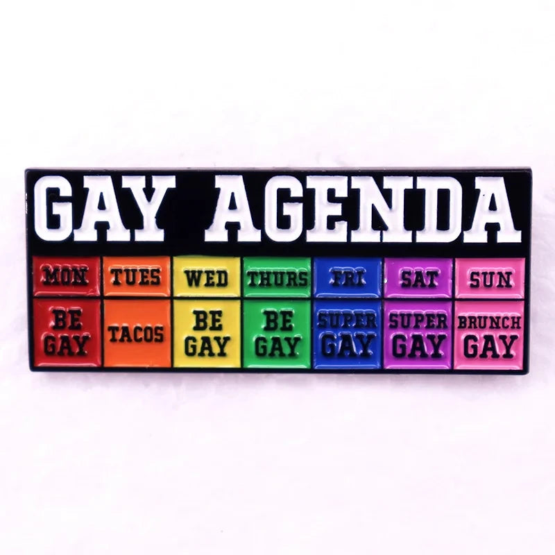 Pin's emaille Gay Agenda, semainier humoristique