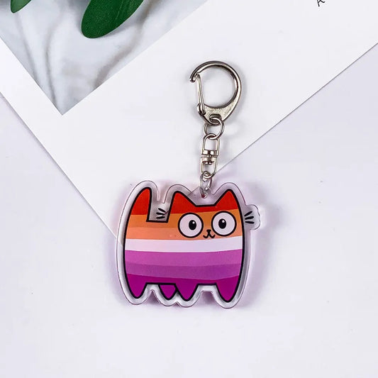 Porte-clés chat aux cinq bandes orange, blanche et roses du drapeau lesbien, acrylique brillant et mousqueton argenté